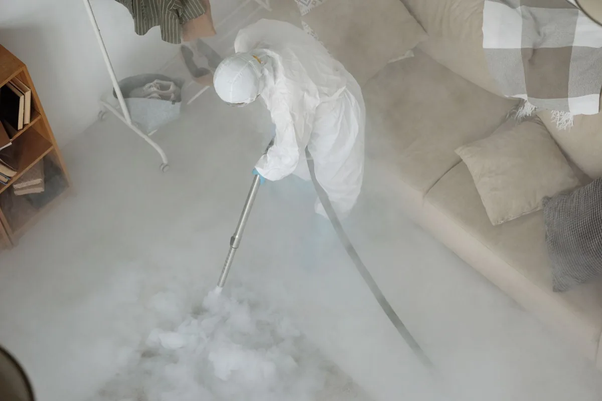 Biohazard cleanup technician in protective equipment, Johnstown, NY